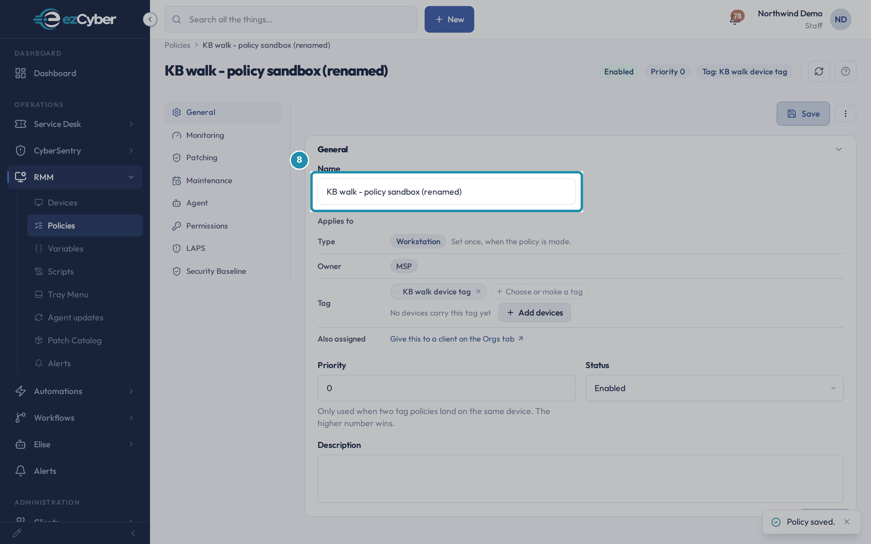 The General tab's Name field now reading 'KB walk - policy sandbox (renamed)', with the page heading updated to match and a 'Policy saved.' toast in the corner.