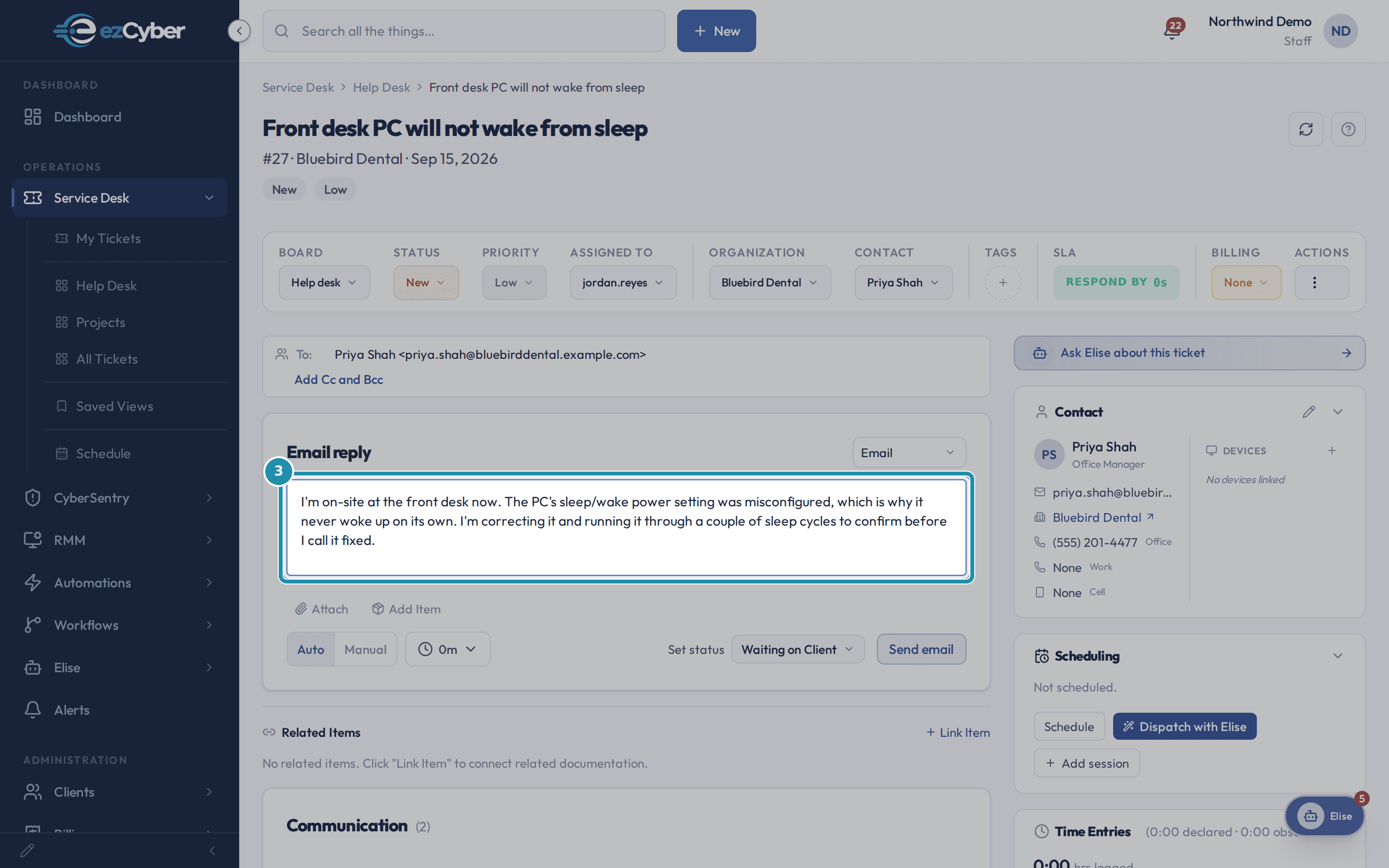 The reply composer with the drafted message about the front desk PC's sleep and wake setting.